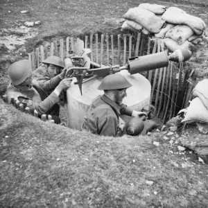 Home Guard soldiers operate a 'Blacker Bombard' spigot mortar during training at No. 3 GHQ Home Guard School at Onibury near Craven Arms in Shropshire, 20 May 1943. Copyright IWM WAR OFFICE SECOND WORLD WAR OFFICIAL COLLECTION.Catalogue number H 30181. Creator Taylor (Lt) War Office official photographer.