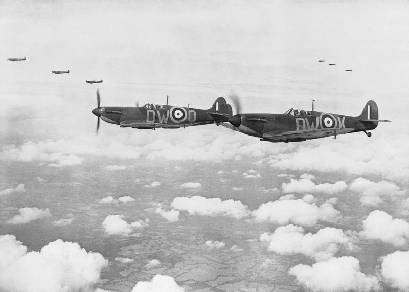 Supermarine Spitfire Mark Is of No. 610 Squadron based at Biggin Hill, flying in 'vic' formation, 24 July 1940. THE SECOND WORLD WAR 1939 - 1945: THE BATTLE OF BRITAIN JULY-SEPTEMBER 1940. © IWM (CH 740) IWM Non Commercial Licence 
