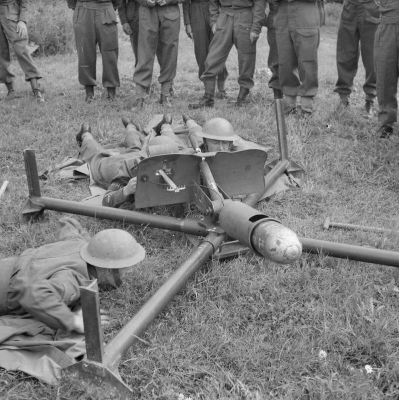 Men of the Saxmundham Home Guard prepare to fire a 'Blacker Bombard' during training with War Office instructors, 30 July 1941. The weapon was a 29mm spigot mortar, designed by a Lieutenant Colonel V V S Blacker, and could fire a 20lb bomb some 900yds. THE HOME GUARD 1939-45. © IWM (H 12299) IWM Non Commercial Licence